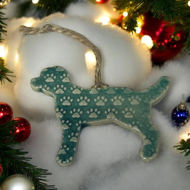 Dog ornament teal paw prints